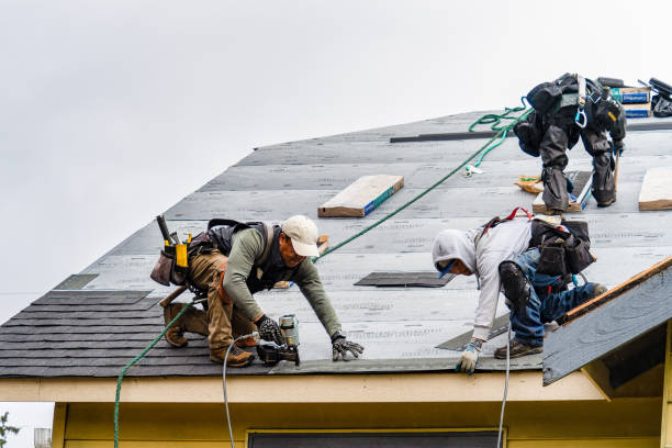 Professional Gutter Installation technician working in Hartland, WI